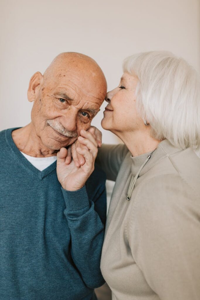 Happy Elderly Couple Holding Hands