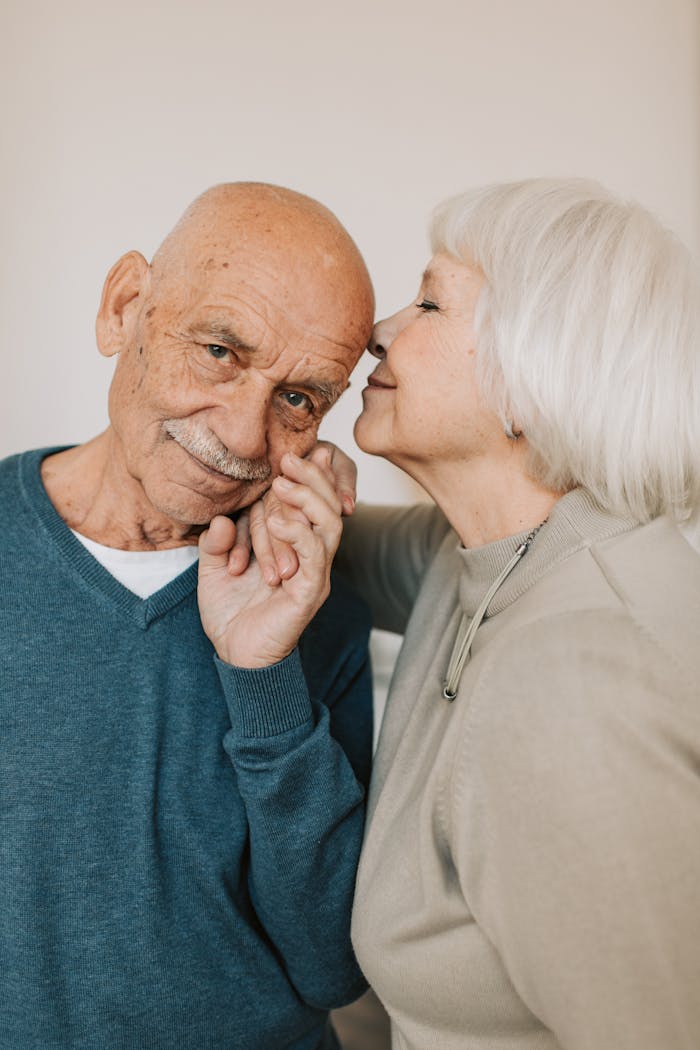 Happy Elderly Couple Holding Hands